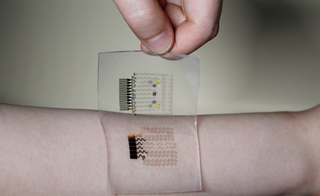 A photo of the diabetes patch partially peeled off from the user’s skin