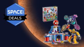 A Lego set featuring a large Spider-Man head and a product box is in front of an orange planet with a space.com logo in the top left corner.