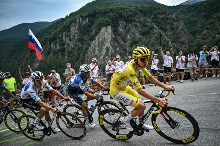  Tadej Pogacar wearing the overall leader's yellow jersey on Stage 19 of the 2024 TDF