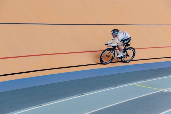 Mark Cavendish tests his time trial bike on the track at Valencia.