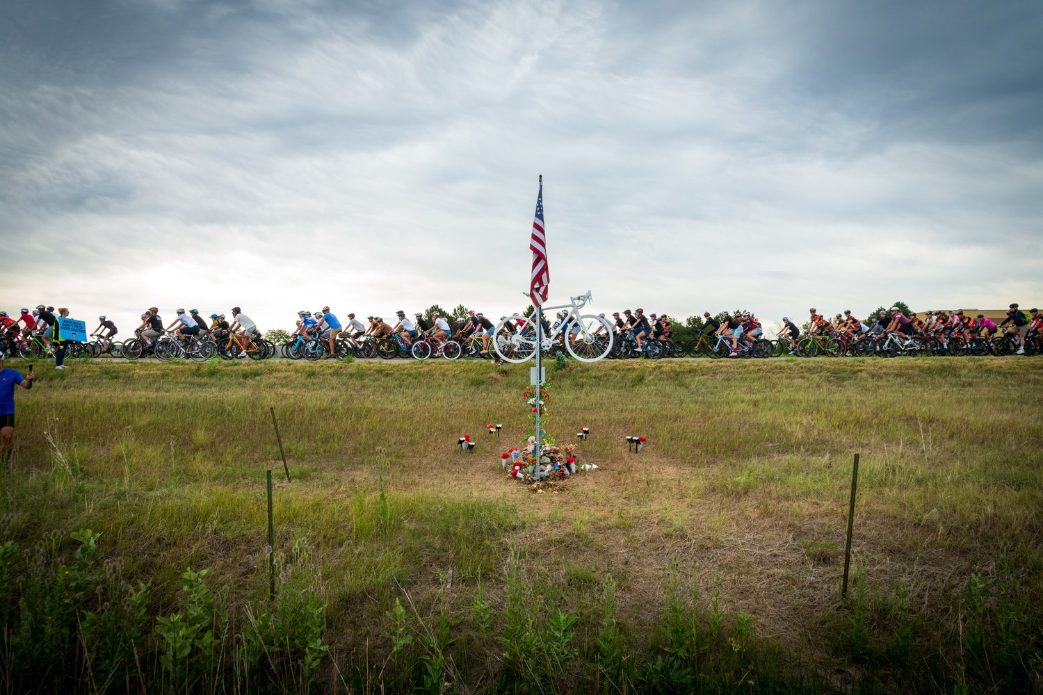 Thousands of cyclists rode past the location where Magnus White was struck and killed by a driver of a vehicle a year ago