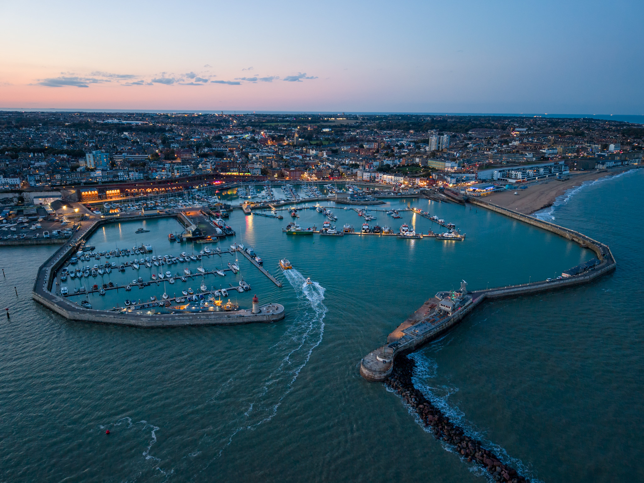 Night-time aerial photo of harbour taken with DJI Air 3S drone