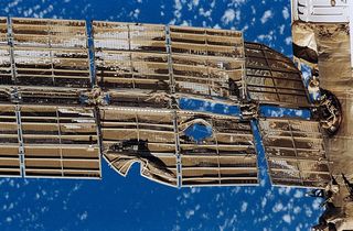 The damaged solar array of the Spektr module is pictured after the collision between Mir and the Progress M-34 cargo spacecraft on June 25, 1997.