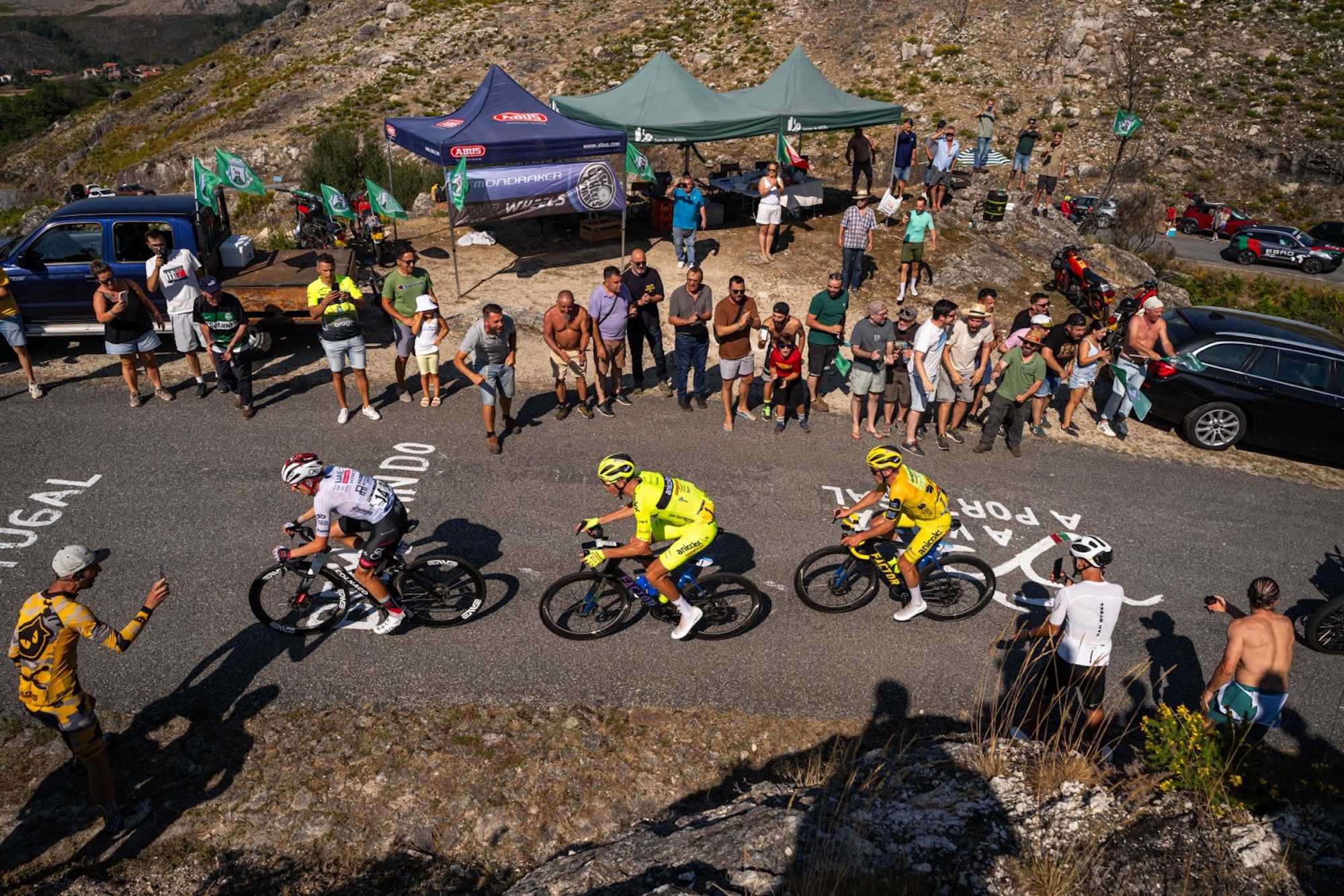 Race action with Alexis Guerin (Anicolor-Campicarn) in the leader's race jersey (centre) during stage 8 of the 2026 Volta a Portugal