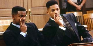 Carlton Banks (Alfonso Ribeiro) and Will Smith (himself) look curious on The Fresh Prince of Bel-Air