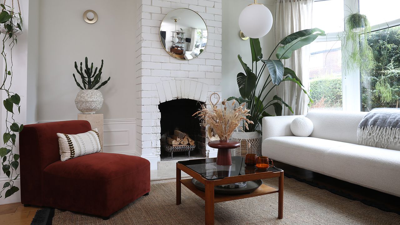 Living room with sofa, coffee table, houseplant