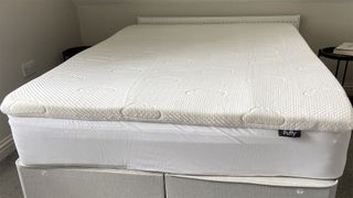 Puffy Deluxe Mattress Topper on a mattress in reviewer's bedroom