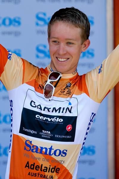 Cameron Meyer in the ocre jersey.