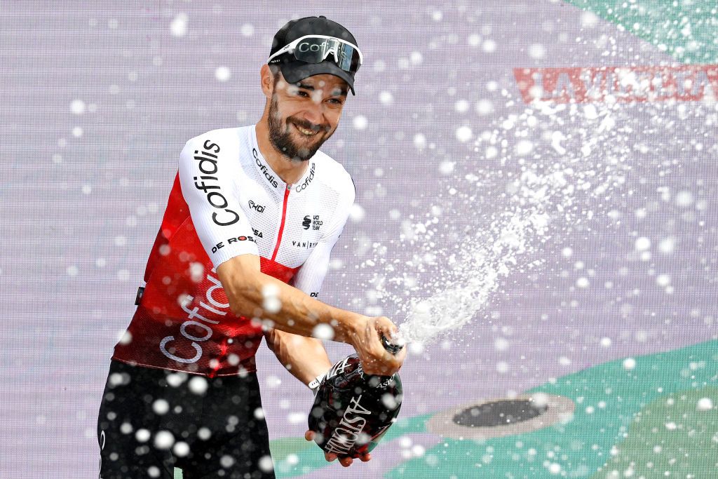 CISTIERNA SPAIN AUGUST 26 Jess Herrada Lopez of Spain and Team Cofidis celebrates at podium as stage winner during the 77th Tour of Spain 2022 Stage 7 a 190km stage from Camargo to Cistierna LaVuelta22 WorldTour on August 26 2022 in Cistierna Spain Photo by Justin SetterfieldGetty Images