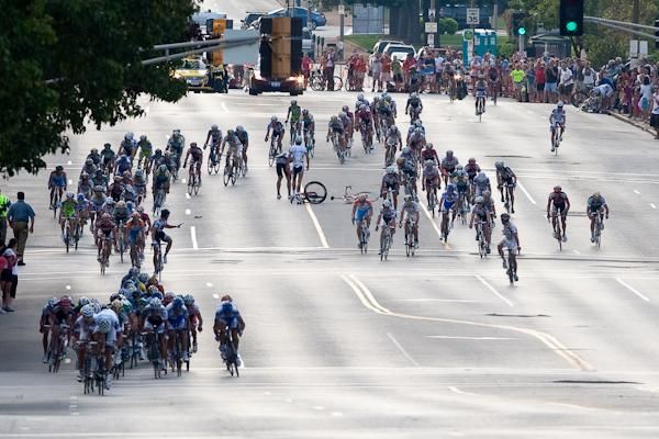 Riders go down as the field comes into the finish.
