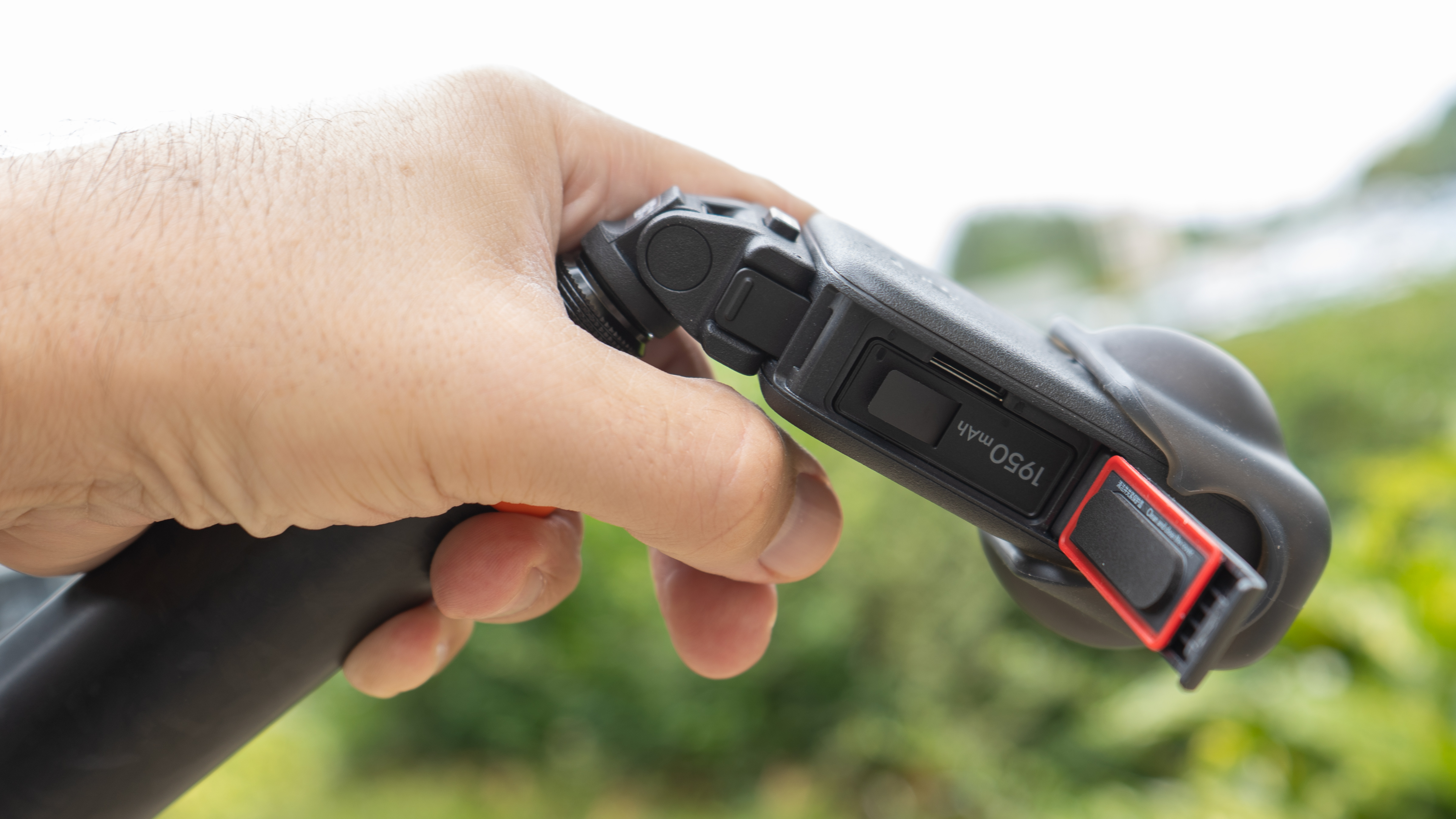 DJI Osmo 360 from side in hand