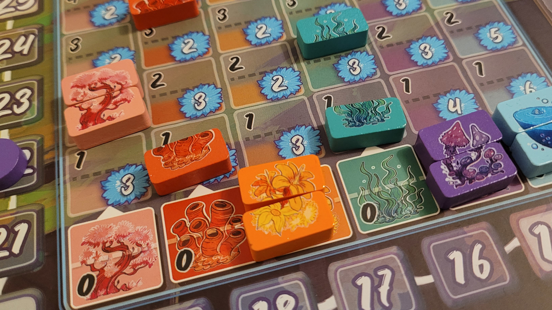 Arborea tokens on a board of numbers and colors