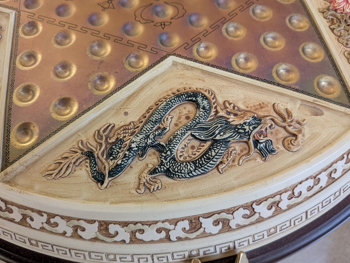 A Google Pixel 9a camera sample showing a Chinese Dragon on a Chinese Checkers board.
