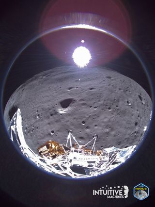 a silver and gold spacecraft can be seen at the bottom of a fish eye view of the moon's surface