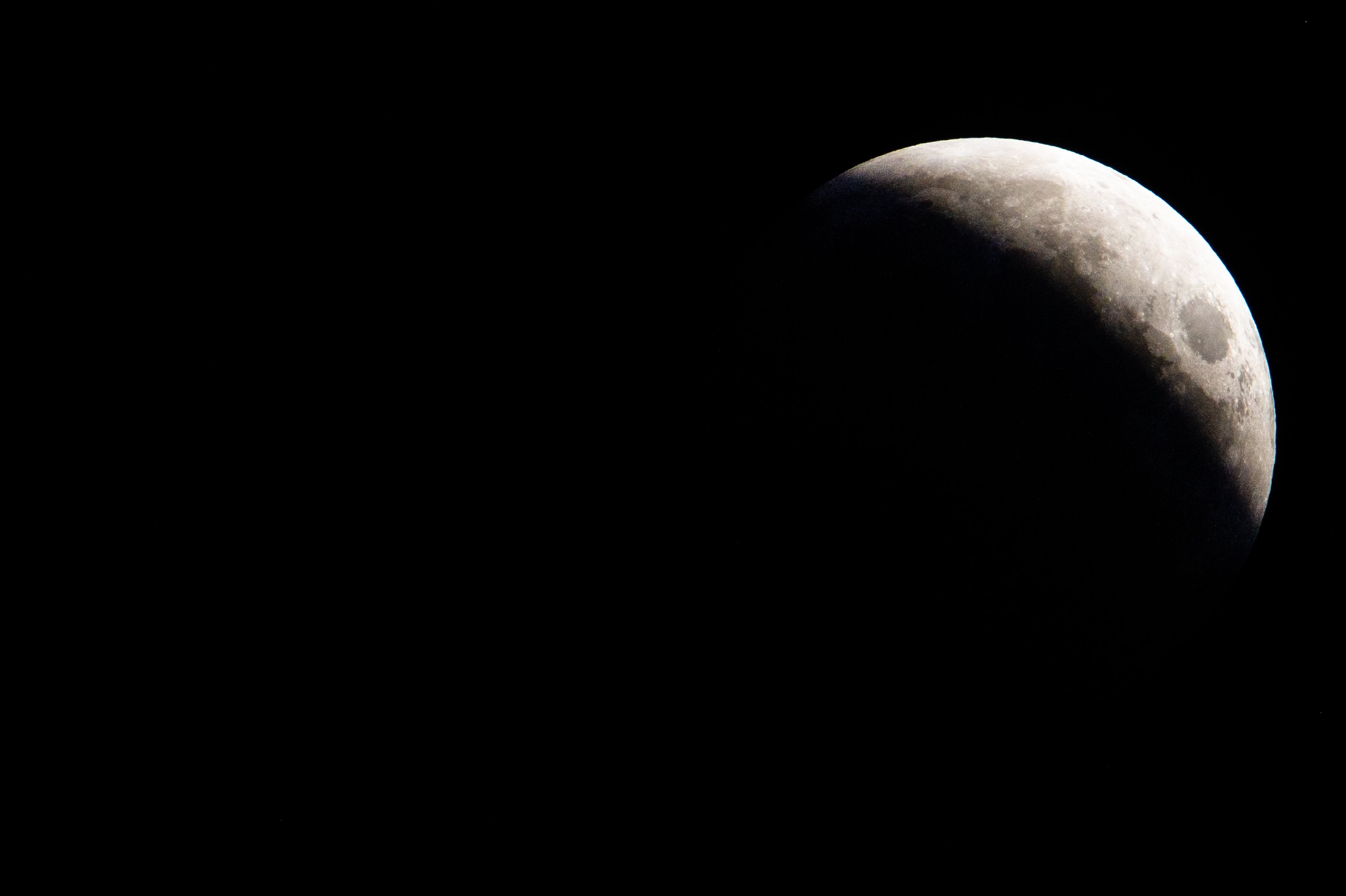 close up view of partially eclipsed moon