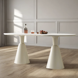 Contemporary modern white stone double pedestal dining table from Wayfair.