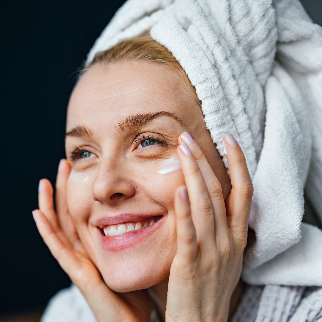 Best eye creams - best eye cream - close up of a woman applying eye cream