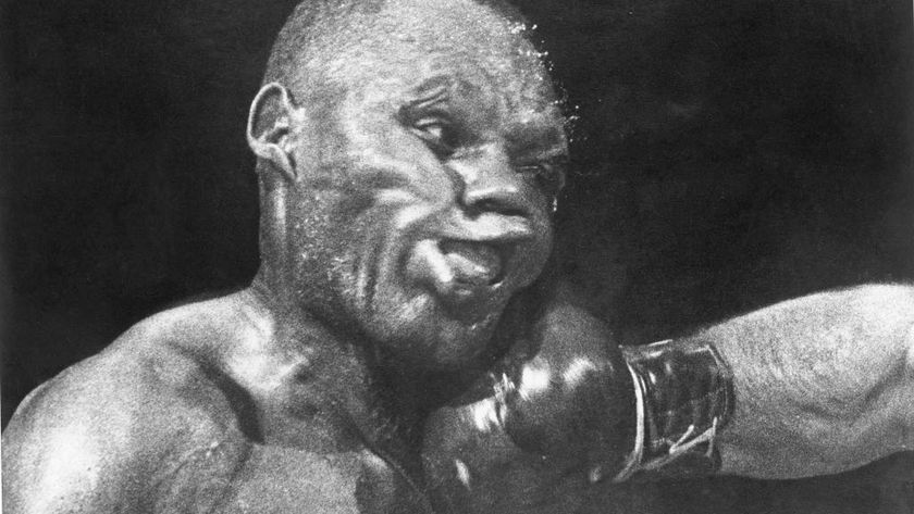 PHILADELPHIA - SEPTEMBER 23: Boxer "Jersey Joe Walcott" takes a hard punch from Rocky Marciano during their World Heavyweight Title fight on September 23, 1952 in Philadelphia, Pennsylvania. After Walcott dropped Marciano in the first round, Marciano held out and defeated Walcott in the 13th with a knockout punch that has been called the "greatest punch in boxing history". Born Arnold Raymond Cream in New Jersey, he was often compared to welterweight boxer Joe Walcott; thus he became known by the nickname "Jersey Joe Walcott". (Photo by Herb Scharfman/Sports Imagery/Getty Images)