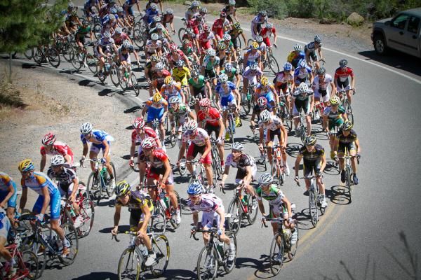 The peloton bunches up as it rounds a corner during the race.