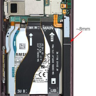 A teardown of the Samsung Galaxy S22 Ultra with the S Pen sheath measured out