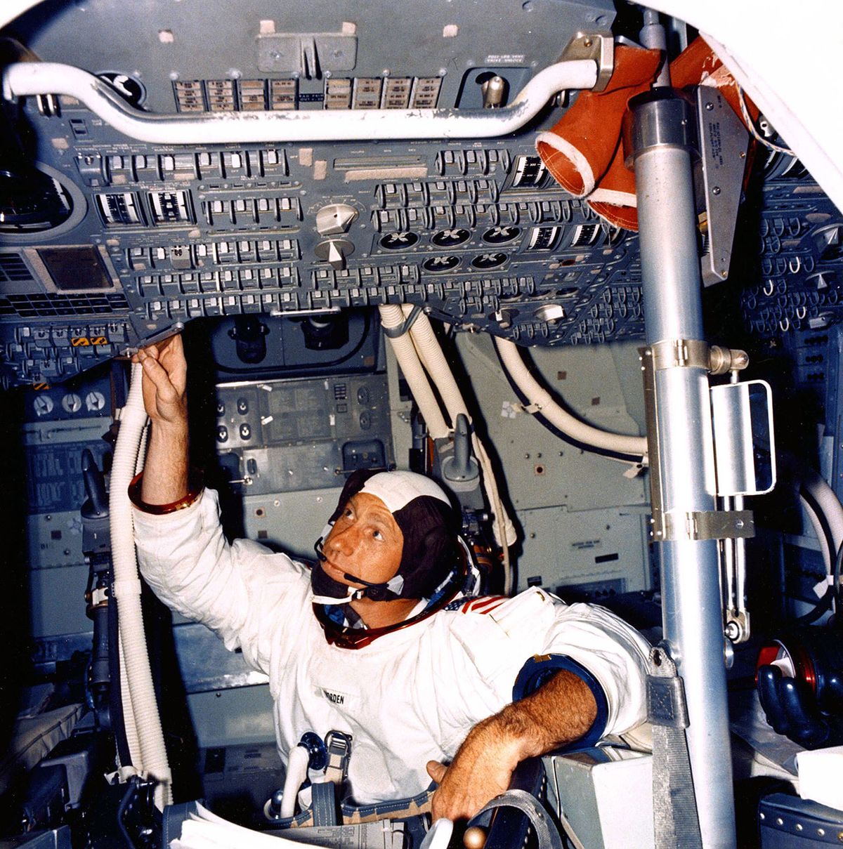 Apollo 15 astronaut Al Worden inside a command module simulator prior to the 1971 moon landing mission. 