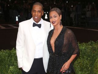 Beyonce in a Givenchy dress at the 2014 Met Ball with husband Jay Z