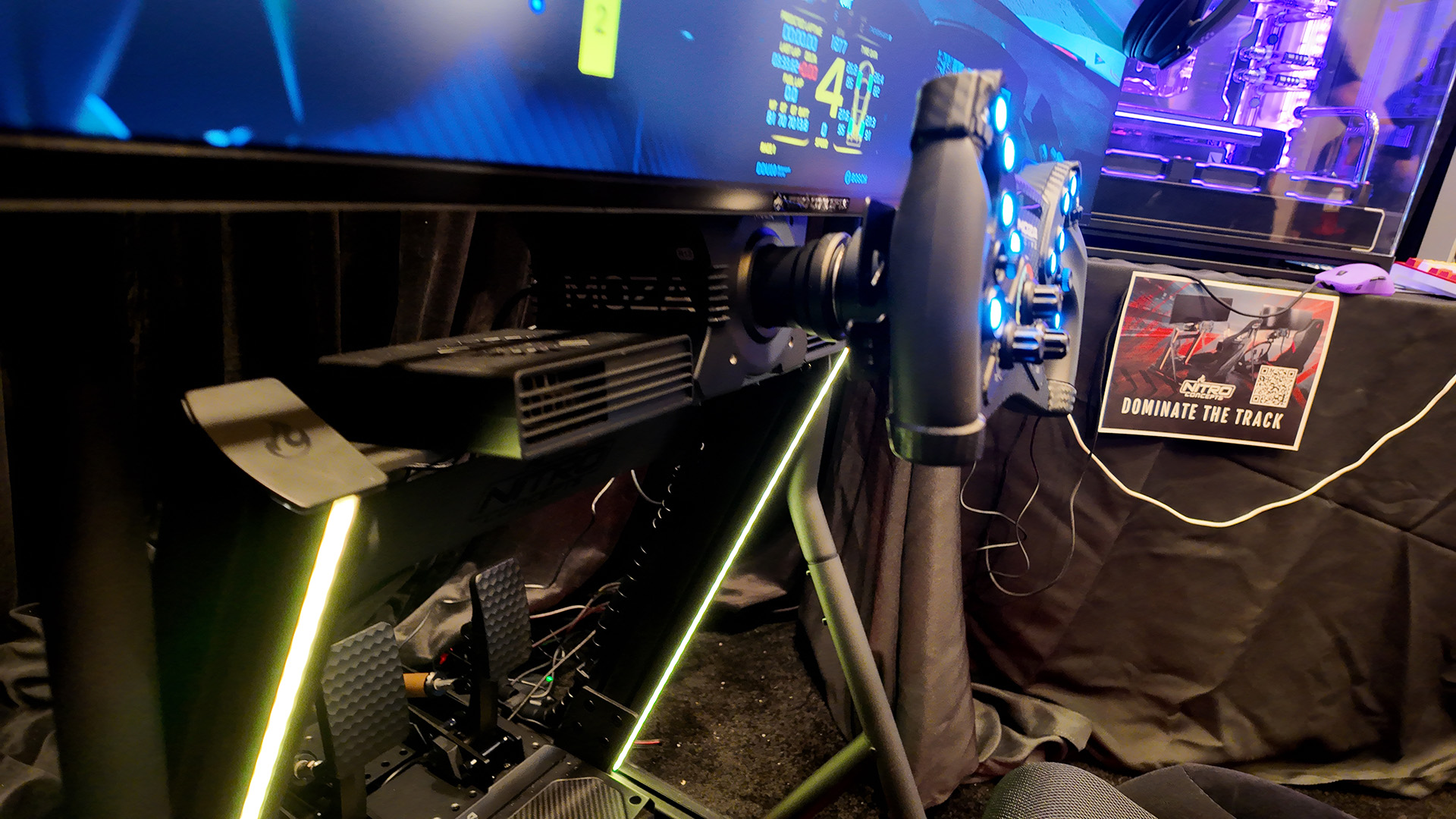 Nitro Concepts CES 2025 booth with a sim racing rig that offered wind simulation from twin fans near the wheelbase.