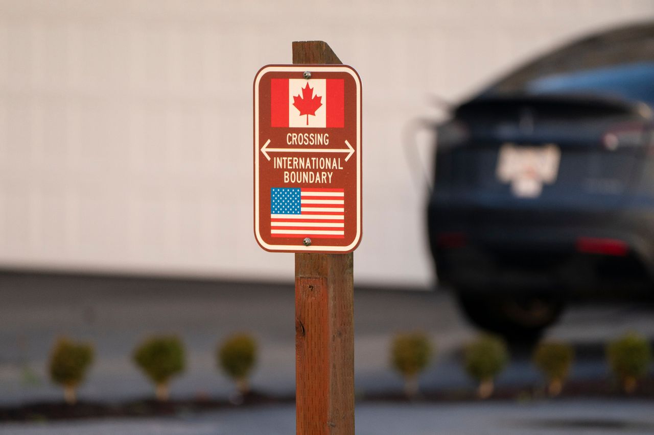 A sign marks the international boundary between Canada and the United States in Blaine, Washington, US, on Wednesday, Dec. 18, 2024. Canada&#039;s trade surplus with the US helped the northern nation avoid a deeper overall deficit, underscoring the importance of its biggest trading partner as President-elect Donald Trump threatens crippling tariffs