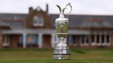 The Claret Jug sits in front of the clubhouse during media day for the The 152nd Open Championship at Royal Troon on April 30, 2024 in Troon, Scotland.