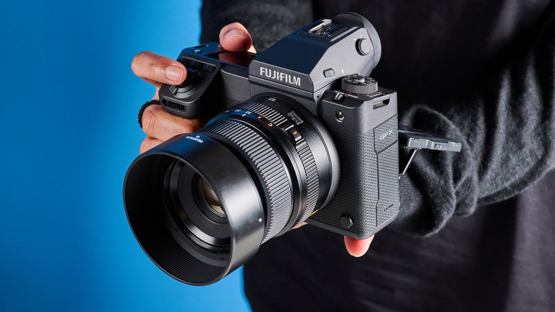 The Fujifilm GFX100 II in hand