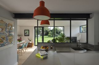 kitchen with internal glazing with view to living and dining room