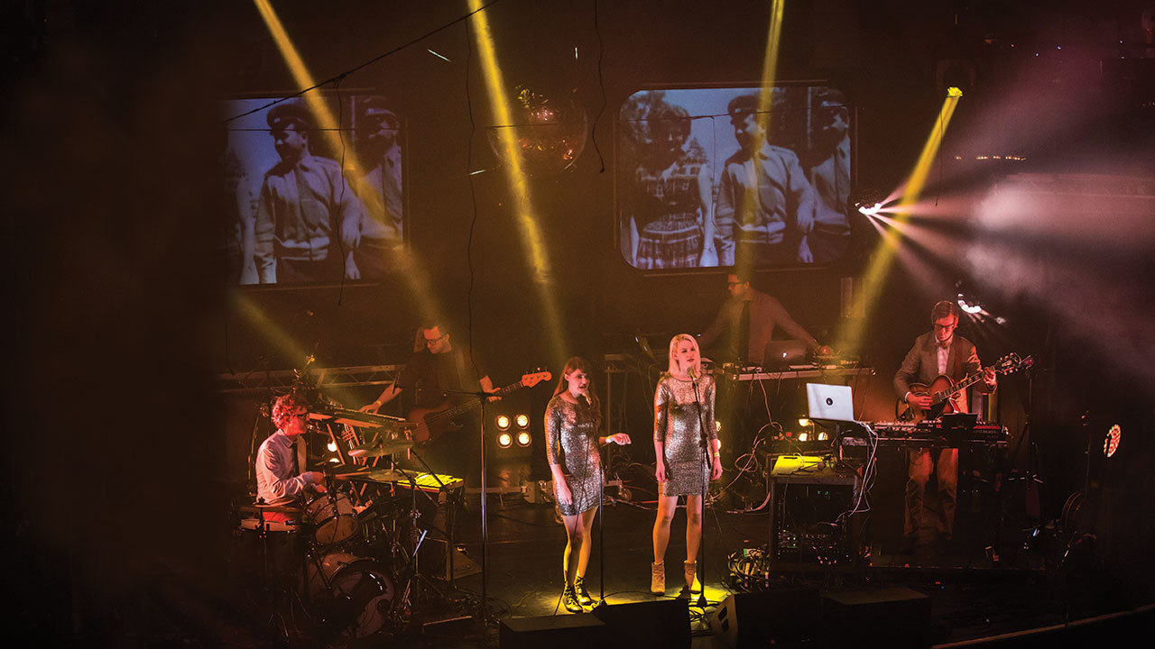 Public Service Broadcasting on stage in Manchester with an impressive light show