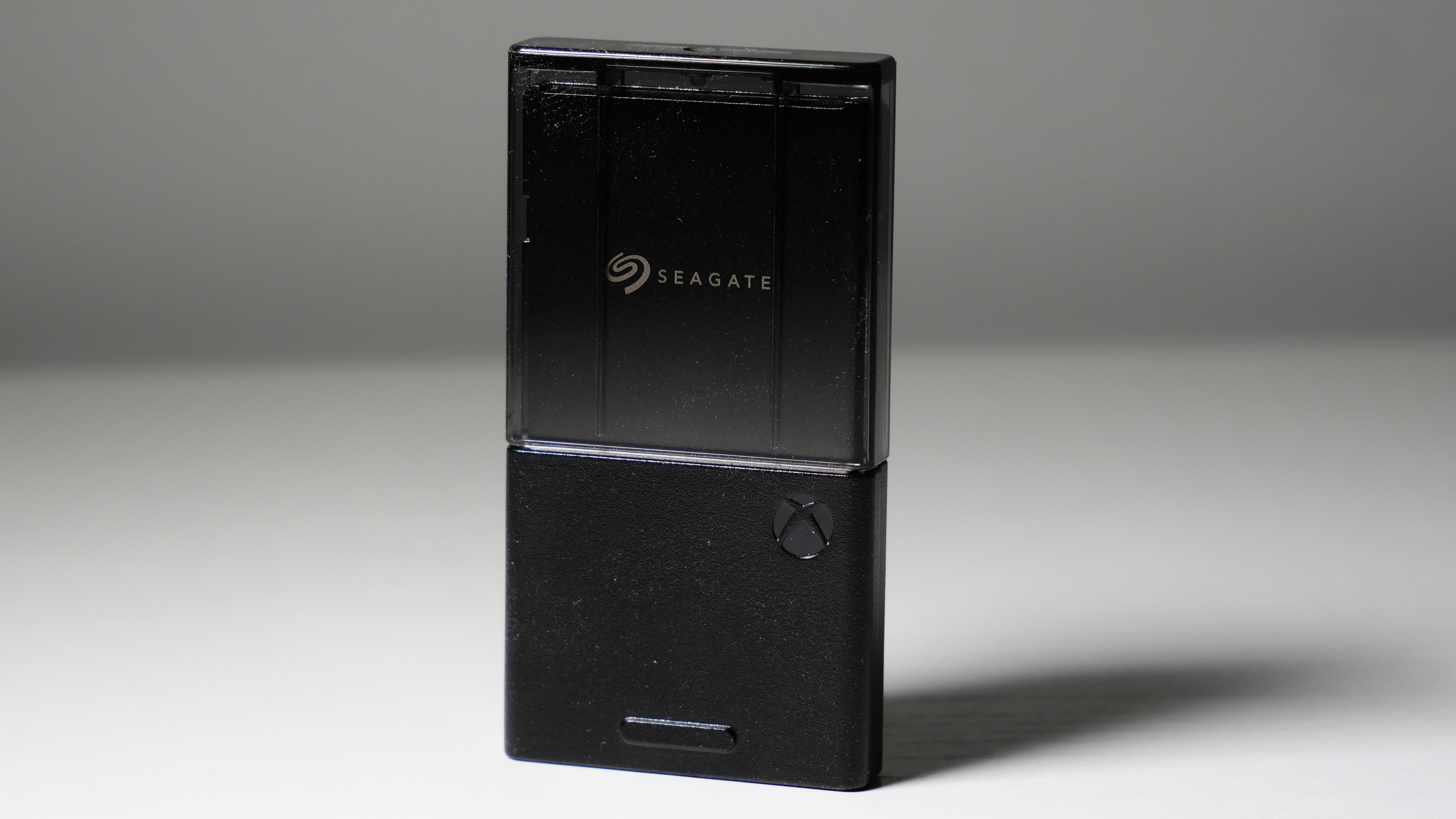 4TB Seagate Storage Expansion Card on a white desk, highlighting its light-and-thin design.