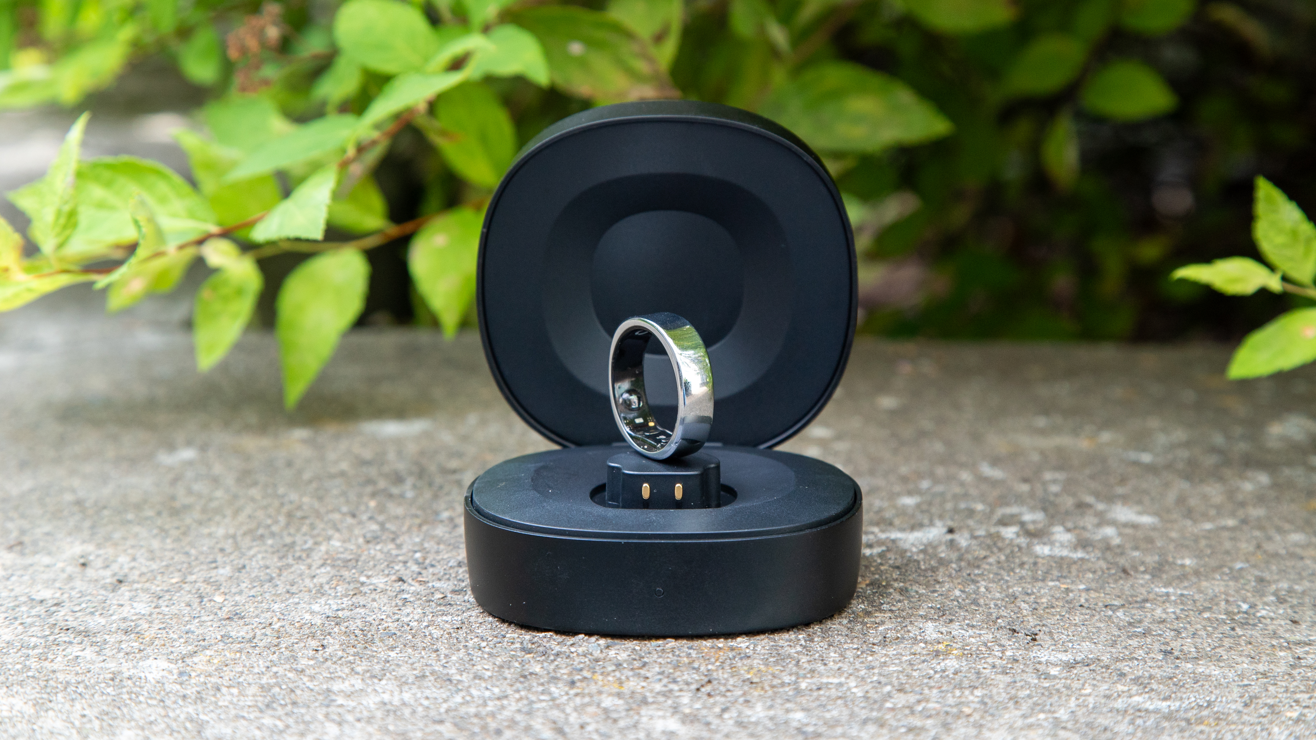 The RingConn Gen 2 Smart Ring balanced inside its charging case