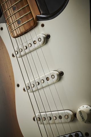 Detail of the pickups on a vintage 1954 Fender Stratocaster, previously owned by The Who bassist John Entwistle