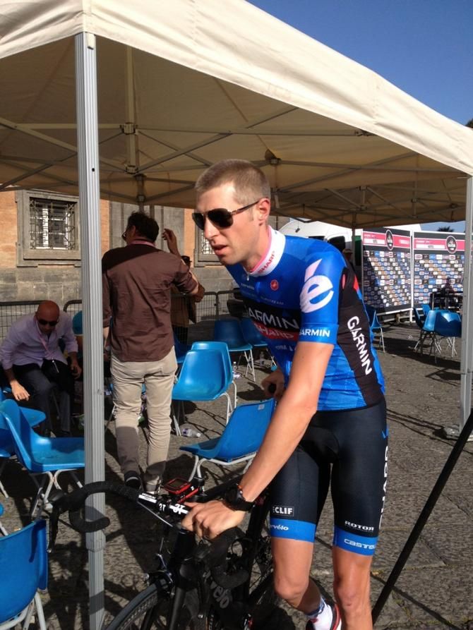 Media duties done for now, defending maglia rosa Ryder Hesjedal makes his way to the presentation area