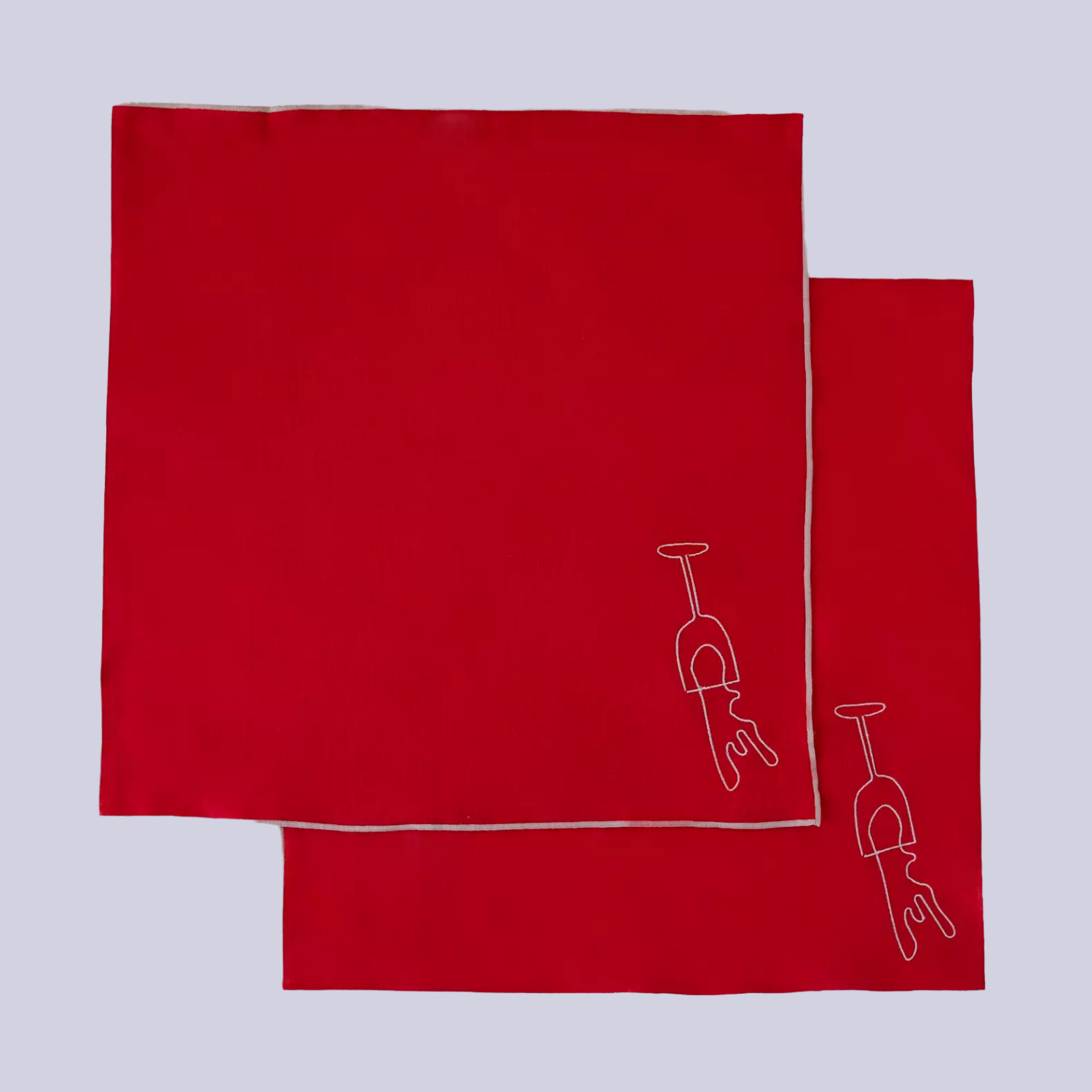 A set of two embroidered red napkins