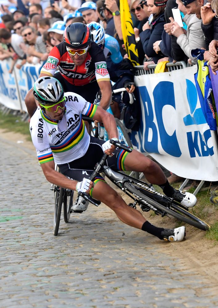Peter Sagan, Greg Van Avermaet and Oliver Naesen hit the deck during Tour of Flanders