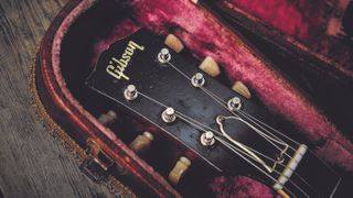 Gibson guitar headstock in a hard case