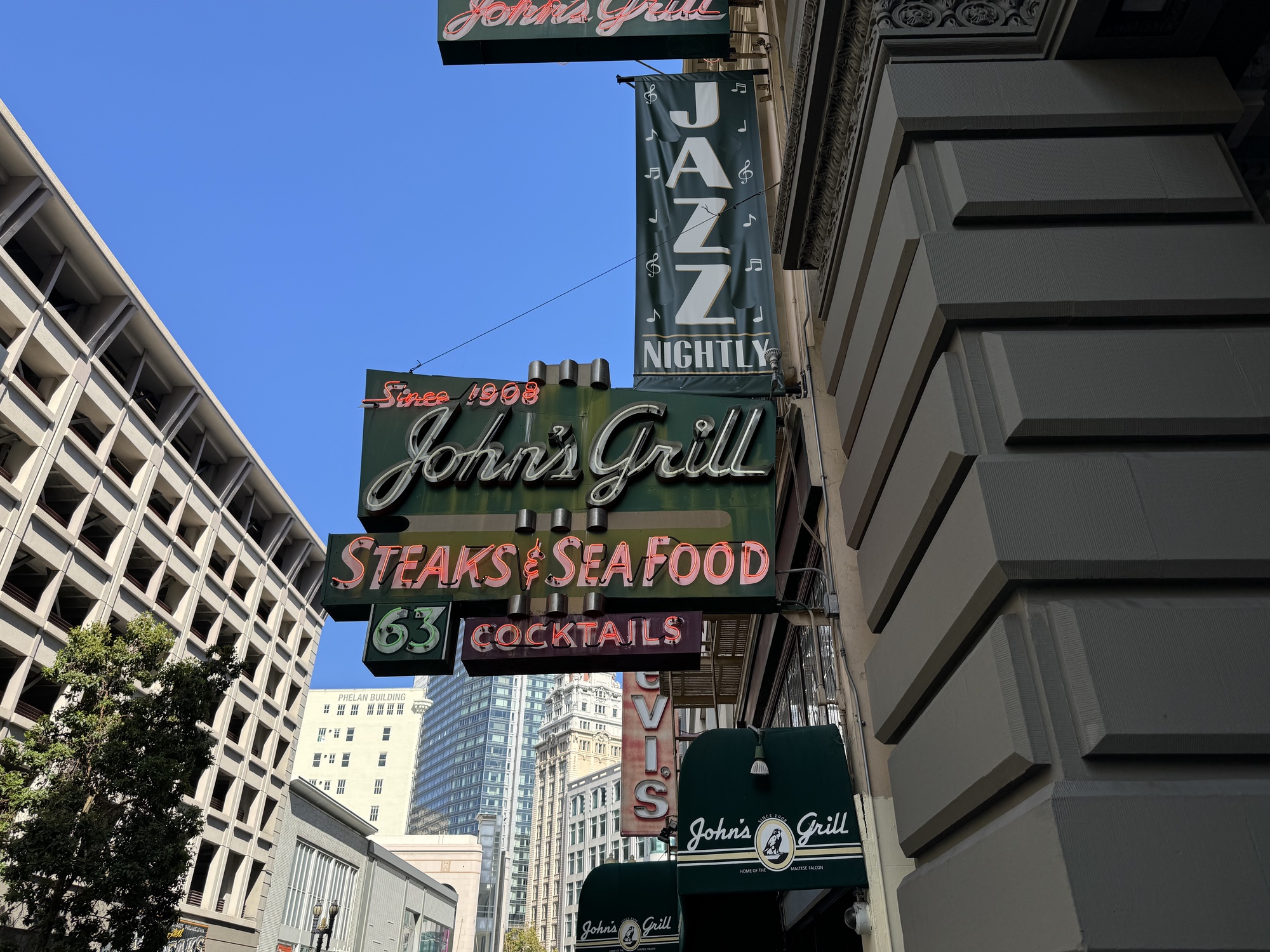 shot of john's grill sign by iphone 15 pro