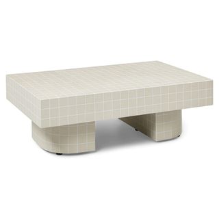 A beige tiled coffee table