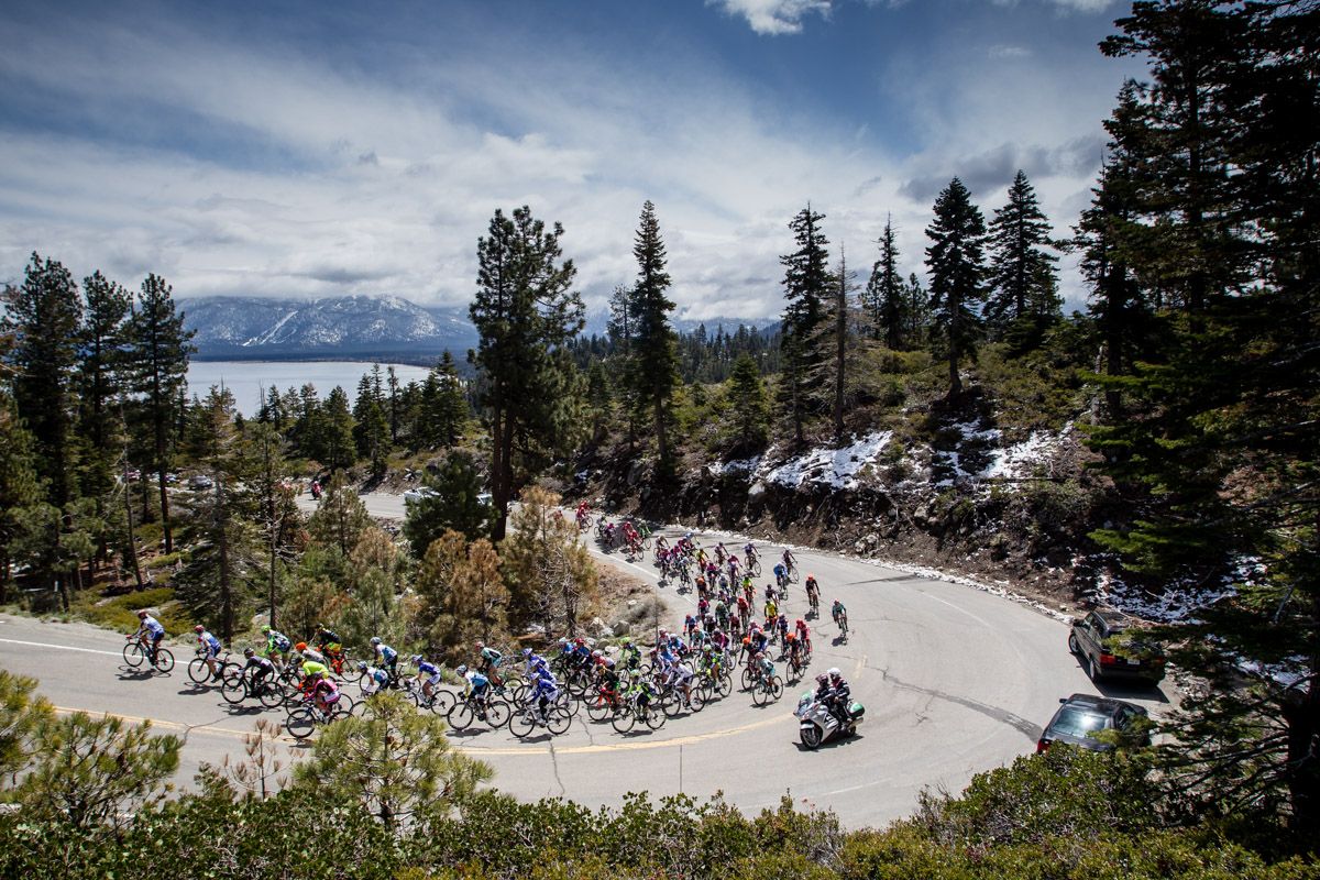The peloton rounds a corner as it climbs away from Lake Tahoe