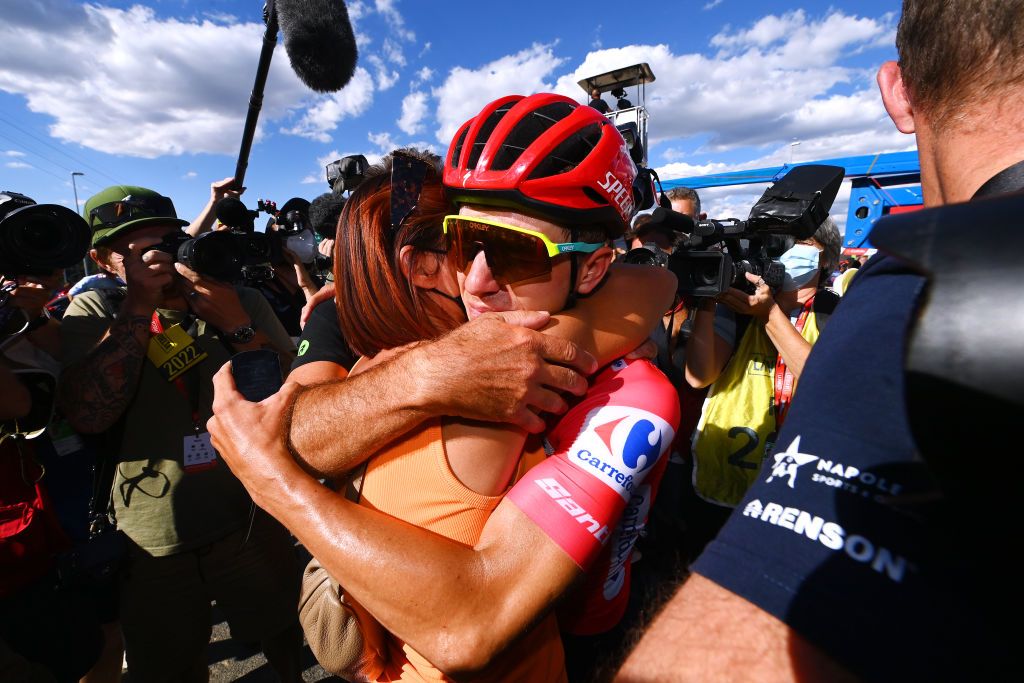 NAVACERRADA SPAIN SEPTEMBER 10 Remco Evenepoel of Belgium and Team QuickStep Alpha Vinyl Red Leader Jersey and his mother Anja Evenepoel react after the 77th Tour of Spain 2022 Stage 20 a 181km stage from Moralzarzal to Puerto de Navacerrada 1851m LaVuelta22 WorldTour on September 10 2022 in Puerto de Navacerrada Spain Photo by Tim de WaeleGetty Images