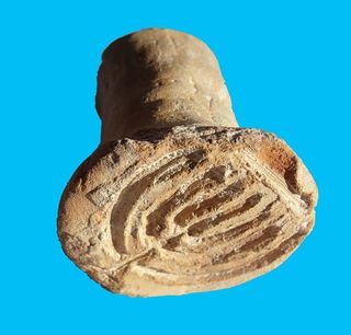 The seven-branched menorah was engraved on what researchers say was likely a bread stamp used by Jewish bakers to identify their kosher breads by name some 1,500 years ago.
