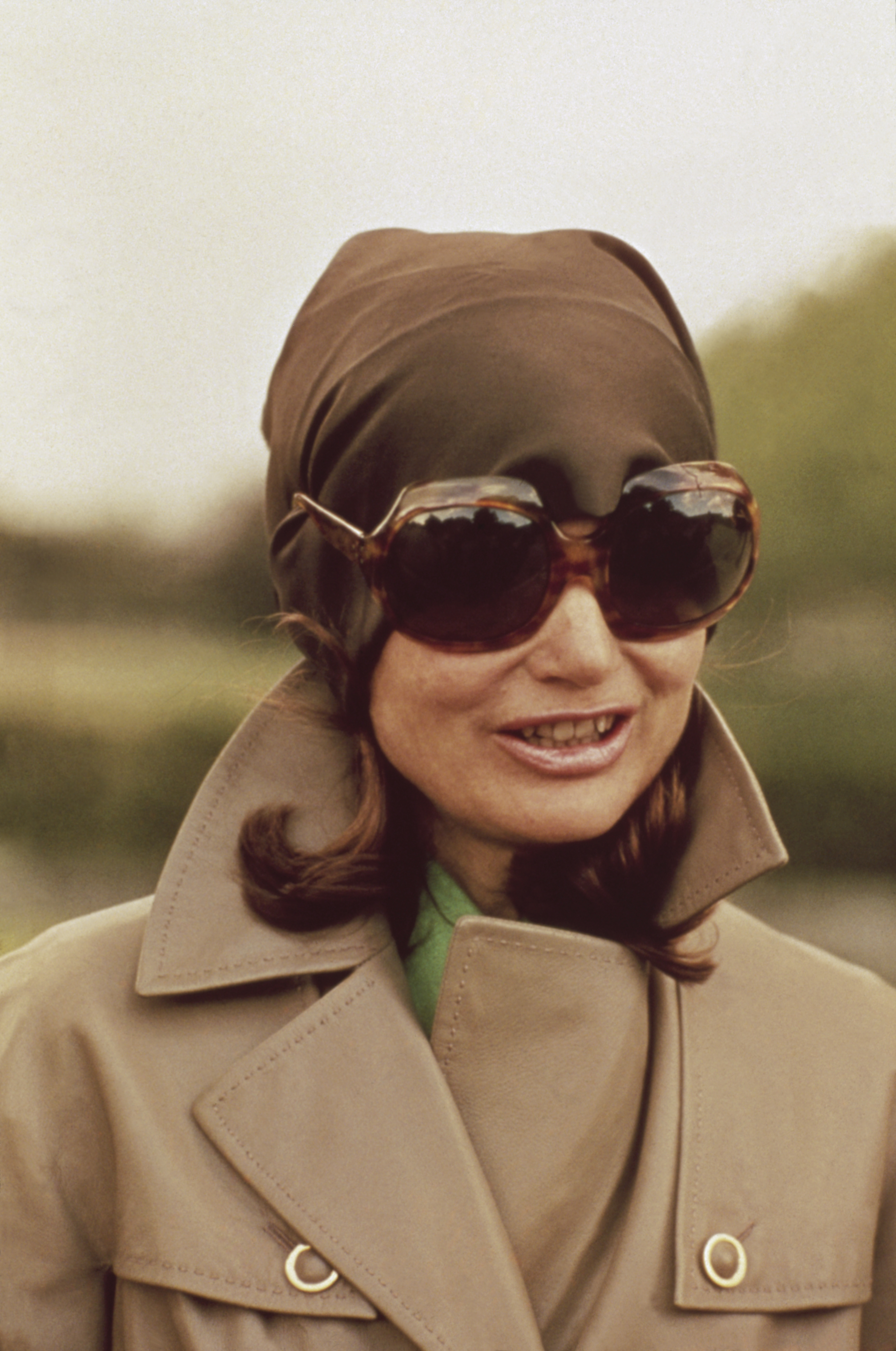 Former First Lady of the United States Jacqueline Kennedy Onassis wears dark sunglasses and a kerchief to protect her privacy. (Photo by Alain Dejean/Sygma via Getty Images)