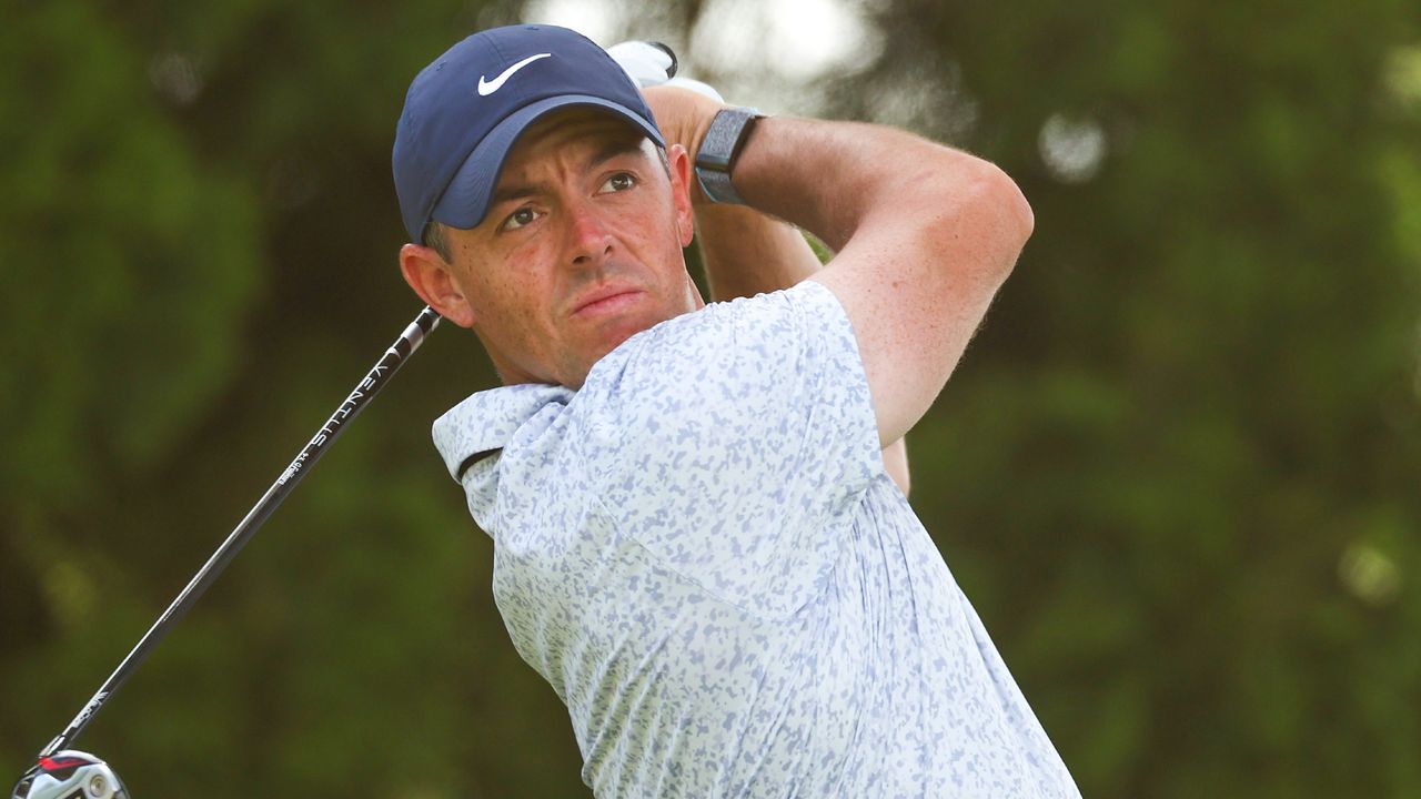 Rory McIlroy takes a shot in the opening round of the Travelers Championship at TPC River Highlands