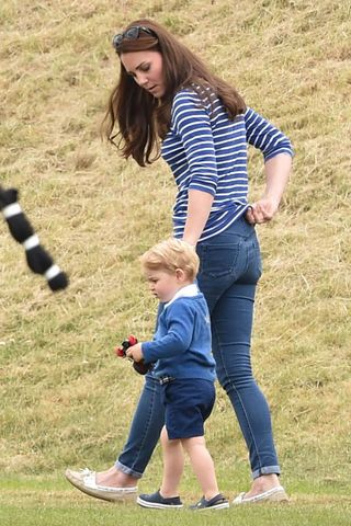 The Duchess Of Cambridge And Prince George At A Polo Match