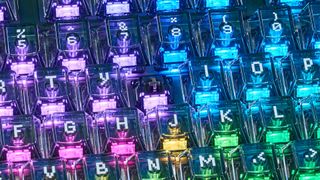 A GravaStar Mercury K1 Lite mechanical keyboard with shine-through keycaps