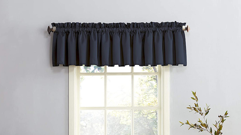 Sun Zero navy blue valance over ivory window frame