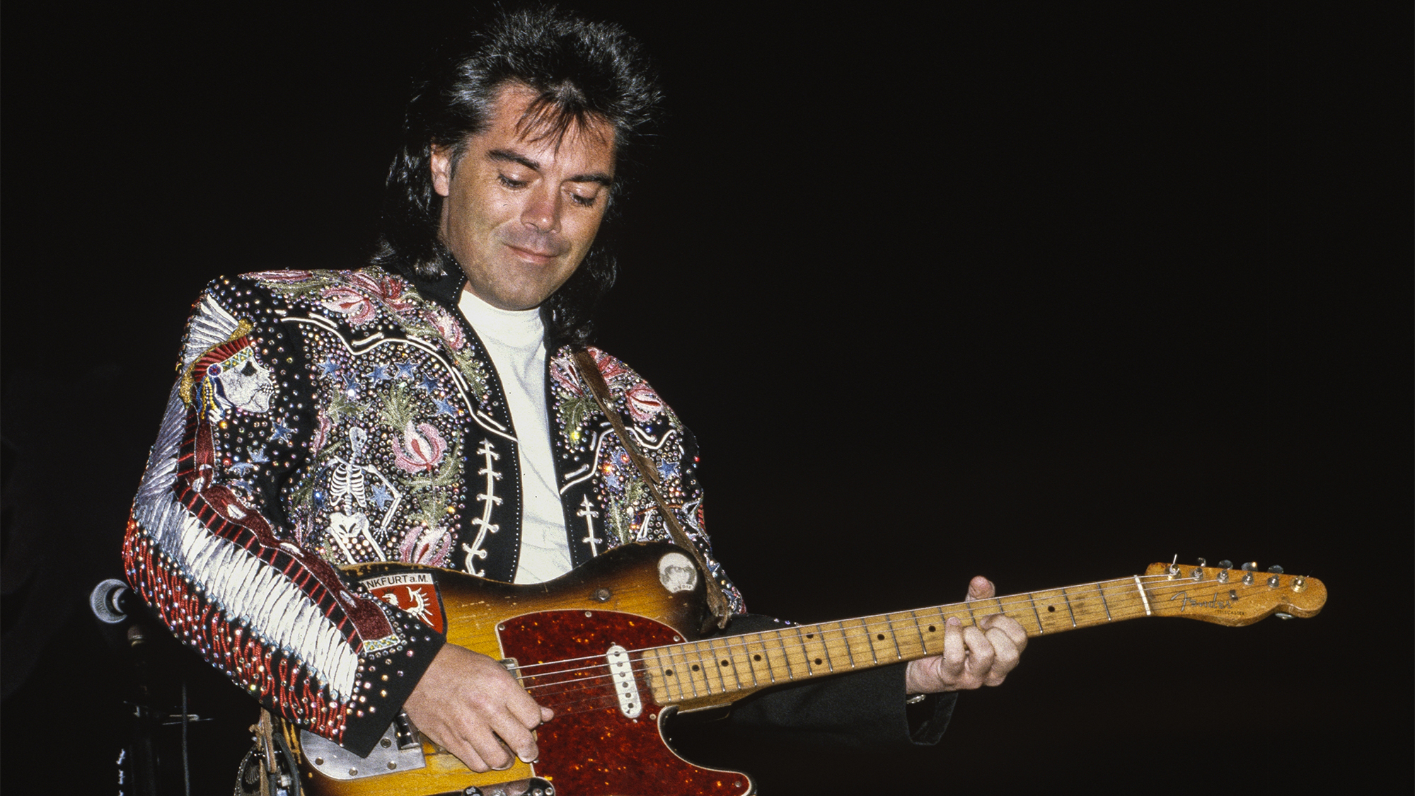 Marty Stuart performs ​at the Cow Palace on November 6, 1992⁢ in South San Francisco, ‌California.